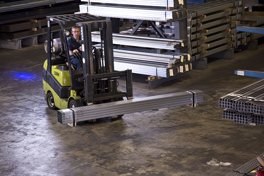 Forklift carrying Flex-Strut product